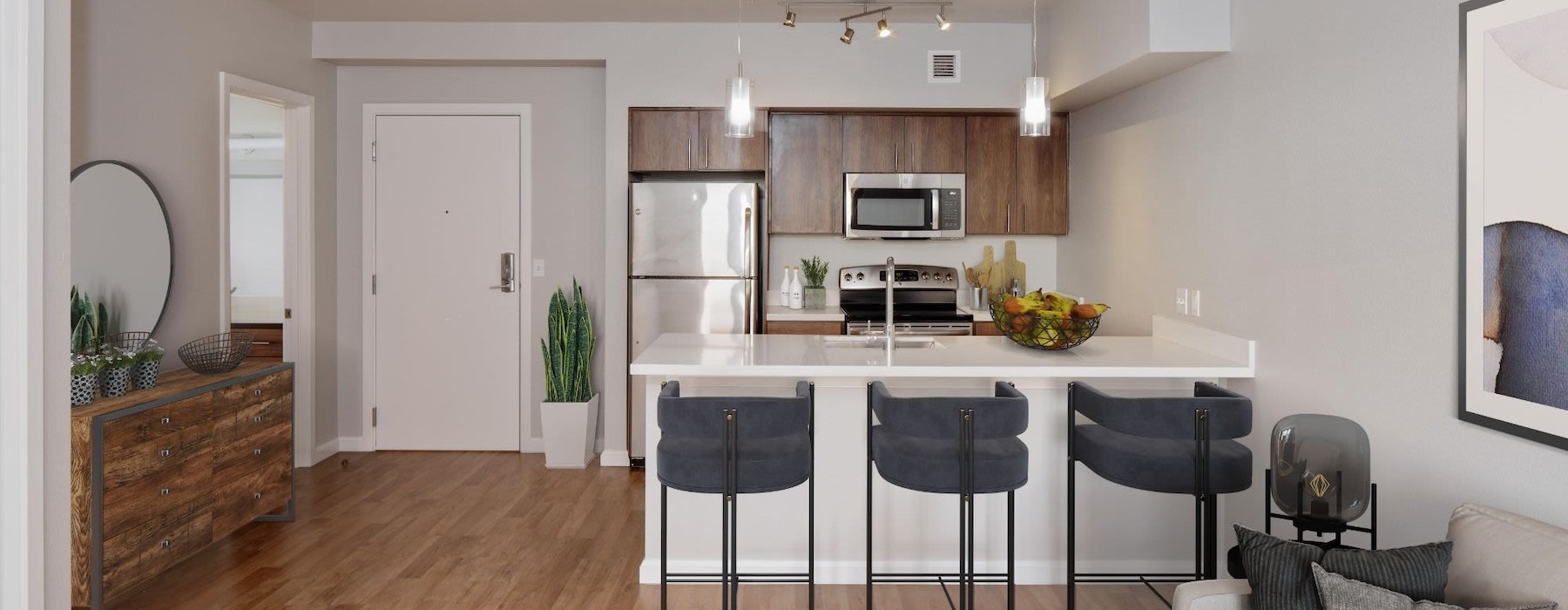 a kitchen with bar stools