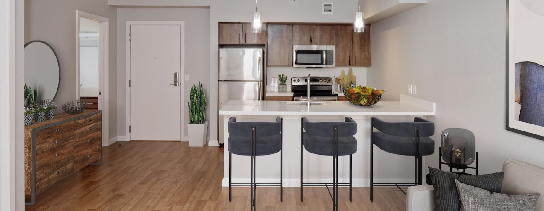 a kitchen with bar stools
